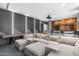 Spacious home theater featuring comfortable seating, projector, and elegant decor at 4763 N 53Rd St, Phoenix, AZ 85018