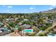 An aerial view showcases a property with a pool and desert landscaping and mountain views at 5307 N 32Nd Pl, Phoenix, AZ 85018