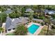 Stunning aerial view of a home with a large swimming pool and lush landscaping at 5307 N 32Nd Pl, Phoenix, AZ 85018