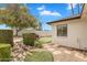 A beautiful backyard featuring a putting green surrounded by professional landscaping at 5307 N 32Nd Pl, Phoenix, AZ 85018
