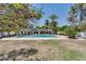A stunning backyard featuring a refreshing blue pool and mature citrus trees at 5307 N 32Nd Pl, Phoenix, AZ 85018