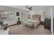 Inviting bedroom with soft colors, plantation shutters, and a comfortable bed at 5307 N 32Nd Pl, Phoenix, AZ 85018