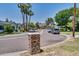 Neighborhood street view showcasing well-maintained homes, mature trees, and a mountain in the background at 5307 N 32Nd Pl, Phoenix, AZ 85018