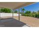 Wide backyard area with shaded patio and landscaping at 5909 E Crocus Dr, Scottsdale, AZ 85254