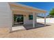 Backyard view featuring the house, patio, and landscaping at 5909 E Crocus Dr, Scottsdale, AZ 85254