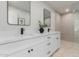 Elegant bathroom with double vanities, modern fixtures, and a walk-in shower at 5909 E Crocus Dr, Scottsdale, AZ 85254