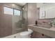 Stylish bathroom with unique concrete sink and step in shower with overhead fixture at 5909 E Crocus Dr, Scottsdale, AZ 85254