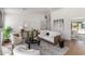 Cozy living room featuring modern decor, stylish furnishings, and plenty of natural light at 5909 E Crocus Dr, Scottsdale, AZ 85254