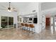 Bright, open kitchen with stainless steel appliances and a breakfast bar at 605 W Sandra Ter, Phoenix, AZ 85023