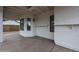 Comfortable back porch with a glass paneled entry door and white columns at 619 N Norfolk --, Mesa, AZ 85205