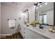 Bathroom featuring dual sinks, marble countertops, and modern fixtures at 619 N Norfolk --, Mesa, AZ 85205