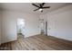 Bedroom featuring two doors with wood flooring throughout the room at 619 N Norfolk --, Mesa, AZ 85205
