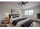 Modern bedroom featuring a comfortable bed, stylish furniture, and bright natural light at 619 N Norfolk --, Mesa, AZ 85205