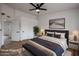 Virtual Staged bedroom featuring a soft rug, and a comfortable bed at 619 N Norfolk --, Mesa, AZ 85205