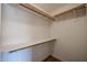 Organized walk-in closet featuring shelves and hanging rods at 619 N Norfolk --, Mesa, AZ 85205