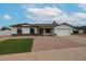 Charming single-story home featuring a two-car garage and landscaped front yard at 619 N Norfolk --, Mesa, AZ 85205