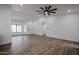 Bright living area features wood-look floors and natural light at 619 N Norfolk --, Mesa, AZ 85205