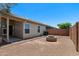 Large backyard featuring a fire pit, hardscape and ample space for entertaining at 6610 E University Dr # 165, Mesa, AZ 85205