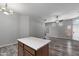Open-concept kitchen island with great flow to the living area and natural light at 6610 E University Dr # 165, Mesa, AZ 85205