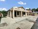 Spacious backyard features a covered patio, stucco exterior, and concrete flooring at 6752 W Citrus Way, Glendale, AZ 85303