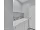 Bright laundry room with full-sized, side-by-side washing machine and dryer at 6752 W Citrus Way, Glendale, AZ 85303