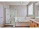 Bathroom with a separate shower and soaking tub at 6833 W Tether Trl, Peoria, AZ 85383
