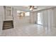 Spacious living room with tile flooring and a stairway to an upper level at 6833 W Tether Trl, Peoria, AZ 85383