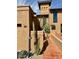 Desert home with a tan stucco exterior, a one car garage and drought-resistant landscaping at 7432 E Hum Rd # 203, Carefree, AZ 85377