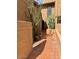 Landscaped walkway with cacti, succulents, and beautiful desert plants leading to the home's entrance at 7432 E Hum Rd # 203, Carefree, AZ 85377