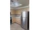 Bright kitchen featuring stainless steel appliances, countertops, and cabinetry at 7575 E Indian Bend Rd # 1100, Scottsdale, AZ 85250