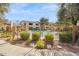 Gated community pool area with lush landscaping, providing privacy and serenity at 7575 E Indian Bend Rd # 1100, Scottsdale, AZ 85250