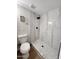 Updated bathroom features marble-look shower tile with a designer shower floor at 954 E Henry St, Tempe, AZ 85288