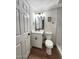 This bathroom features a new vanity and a white door at 954 E Henry St, Tempe, AZ 85288