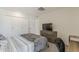 The bedroom features a tv, dresser, and closet at 9814 W Long Hills Dr, Sun City, AZ 85351