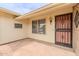 Charming entryway with tiled flooring, security door, and decorative wall art adding character at 9814 W Long Hills Dr, Sun City, AZ 85351