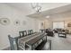 Bright living and dining area, featuring stylish decor and seamlessly flowing layout at 9814 W Long Hills Dr, Sun City, AZ 85351