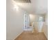 Upstairs hallway leading to bedrooms and bathrooms with neutral carpet and white walls at 9998 W Prospector Dr, Queen Creek, AZ 85144
