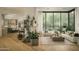 Bright living room with wood floors and a desert landscape view through a large window at 10040 E Happy Valley Rd # 1011, Scottsdale, AZ 85255