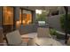Outdoor patio features a built-in BBQ grill, comfortable seating, and desert landscaping at 10040 E Happy Valley Rd # 1011, Scottsdale, AZ 85255