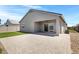 Large backyard featuring a covered patio and a large brick patio at 1090 E Horro Rd, Queen Creek, AZ 85143