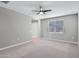 Bedroom featuring carpeted floor and ceiling fan at 1090 E Horro Rd, Queen Creek, AZ 85143