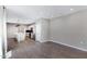 Open-concept living area with modern tile flooring and ample natural light at 1090 E Horro Rd, Queen Creek, AZ 85143