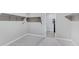 Spacious walk-in closet with shelving and carpeted floor at 1090 E Horro Rd, Queen Creek, AZ 85143