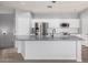 Modern kitchen featuring white cabinetry, stainless steel appliances, gray counters, and recessed lighting at 1265 S Aaron -- # 341, Mesa, AZ 85209