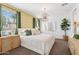 Comfortable bedroom with a large bed, decorative pillows, and natural lighting at 1331 S Vista Ave, Florence, AZ 85132