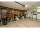 Garage with plenty of cabinet storage and space for working on projects at 13731 W Greenview Dr, Sun City West, AZ 85375