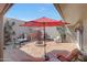 Backyard featuring a patio, a fire pit, seating, grill, and updated fixtures at 13806 N Del Webb Blvd, Sun City, AZ 85351