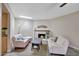 Living room with fireplace and bright natural light at 13806 N Del Webb Blvd, Sun City, AZ 85351