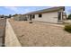 Home exterior featuring a desert front yard and a sidewalk at 1399 E Santa Fiore St, San Tan Valley, AZ 85140