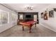 Game room featuring a pool table, wet bar, and stylish decor for entertaining guests at 1446 E Douglas St, Casa Grande, AZ 85122